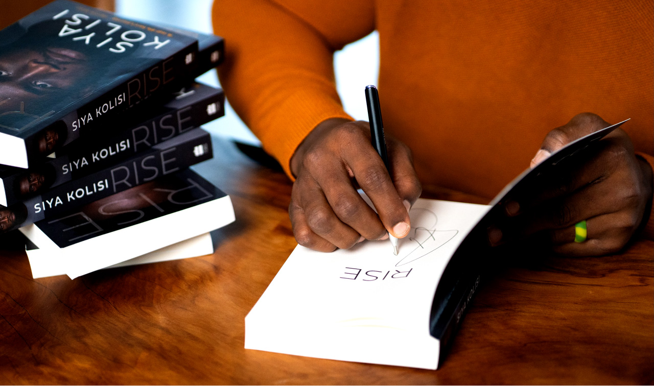 BOS Marketing x Siya kolisi studio shoot featuring signed book prizes